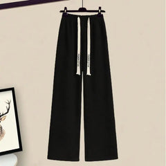 Bold Stripes Cutout Sweater with wide leg pants