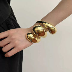Golden Flow Statement Ring
