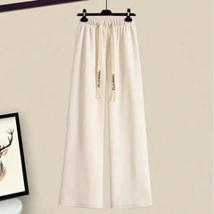 Bold Stripes Cutout Sweater with wide leg pants